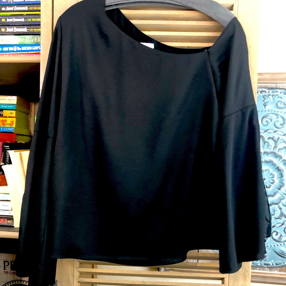 Classic blouse slightly off one shoulder/